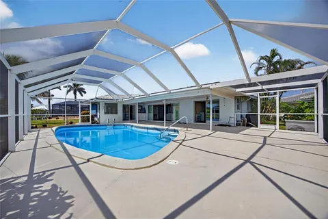 a view of a house with swimming pool