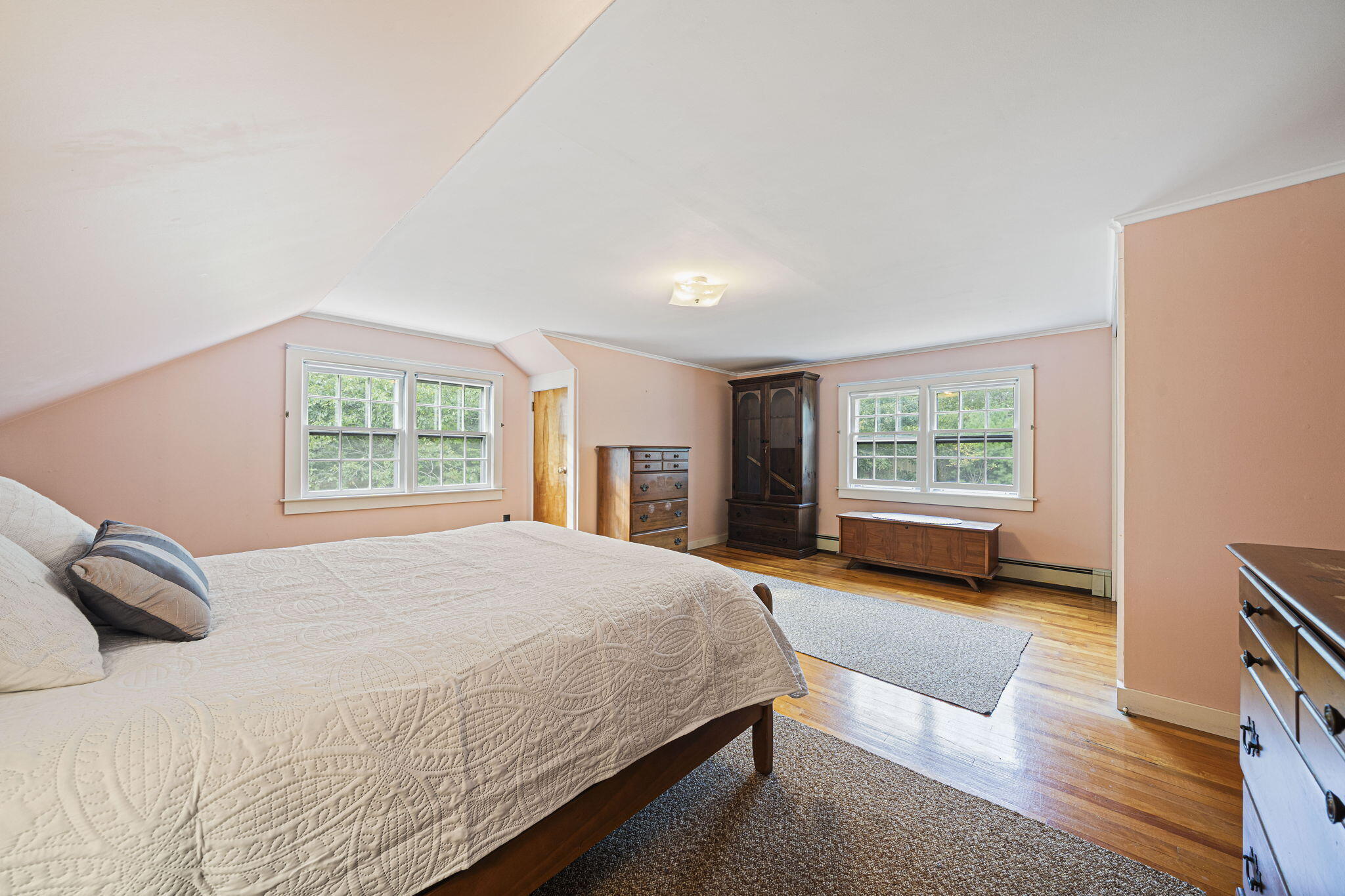 606 County Road Pocasset, MA 02559 - Photo 11 of 36 a bedroom with a bed and a couch