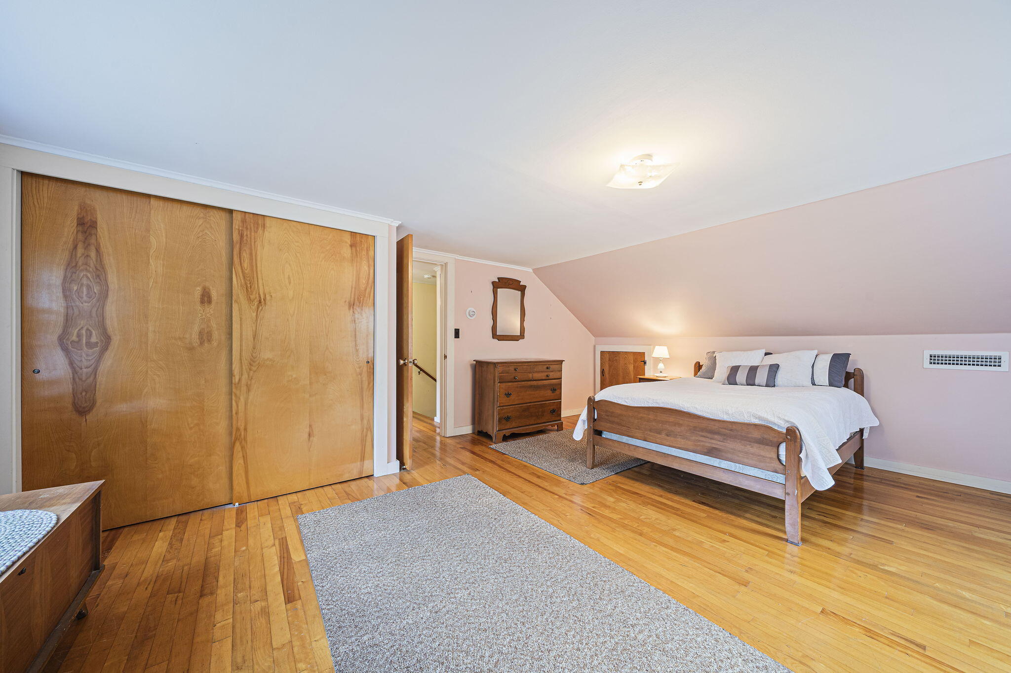 606 County Road Pocasset, MA 02559 - Photo 12 of 36 a spacious bedroom with a bed and a dresser