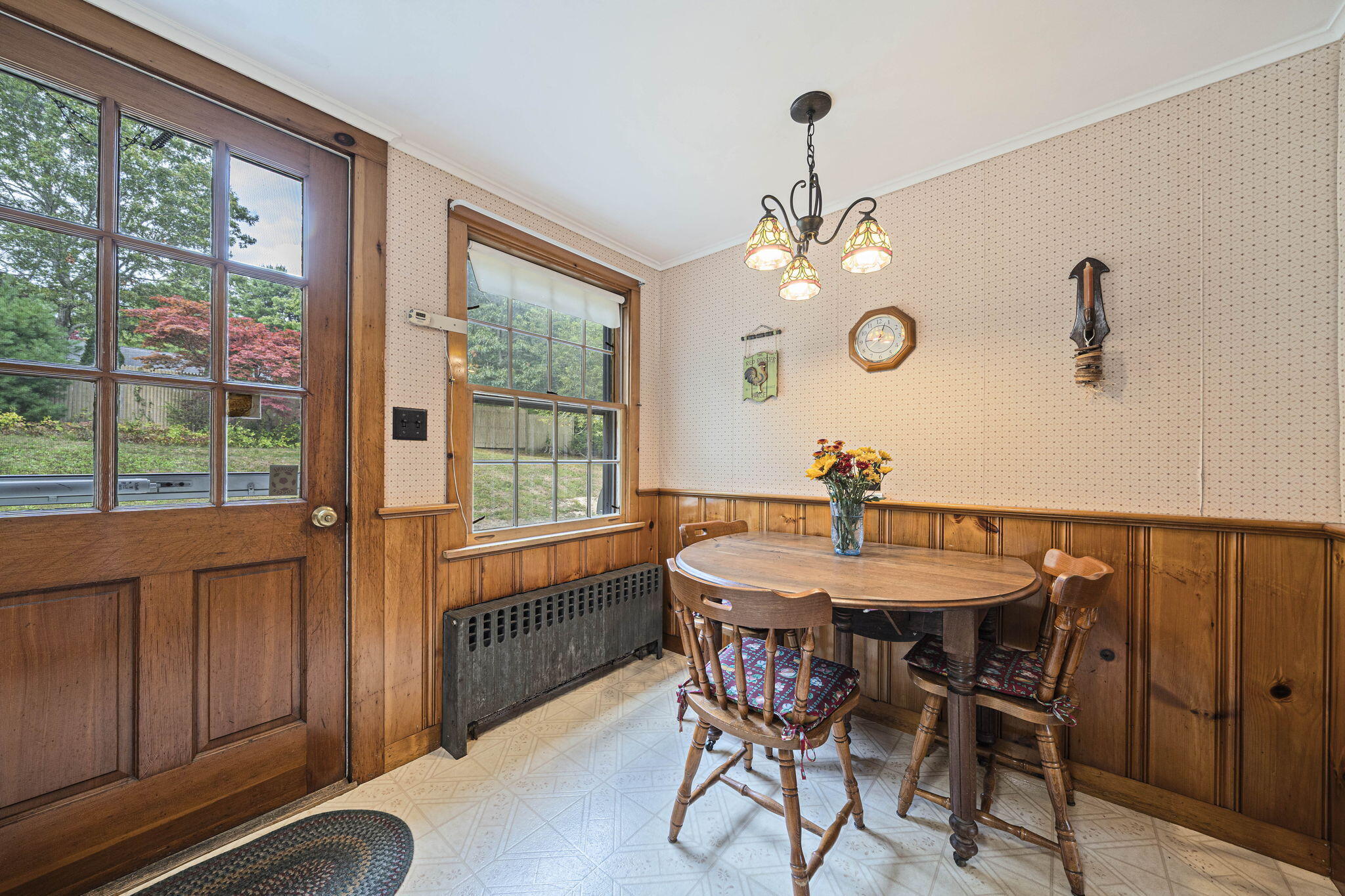606 County Road Pocasset, MA 02559 - Photo 17 of 36 a view of a dining room with furniture window and outside view