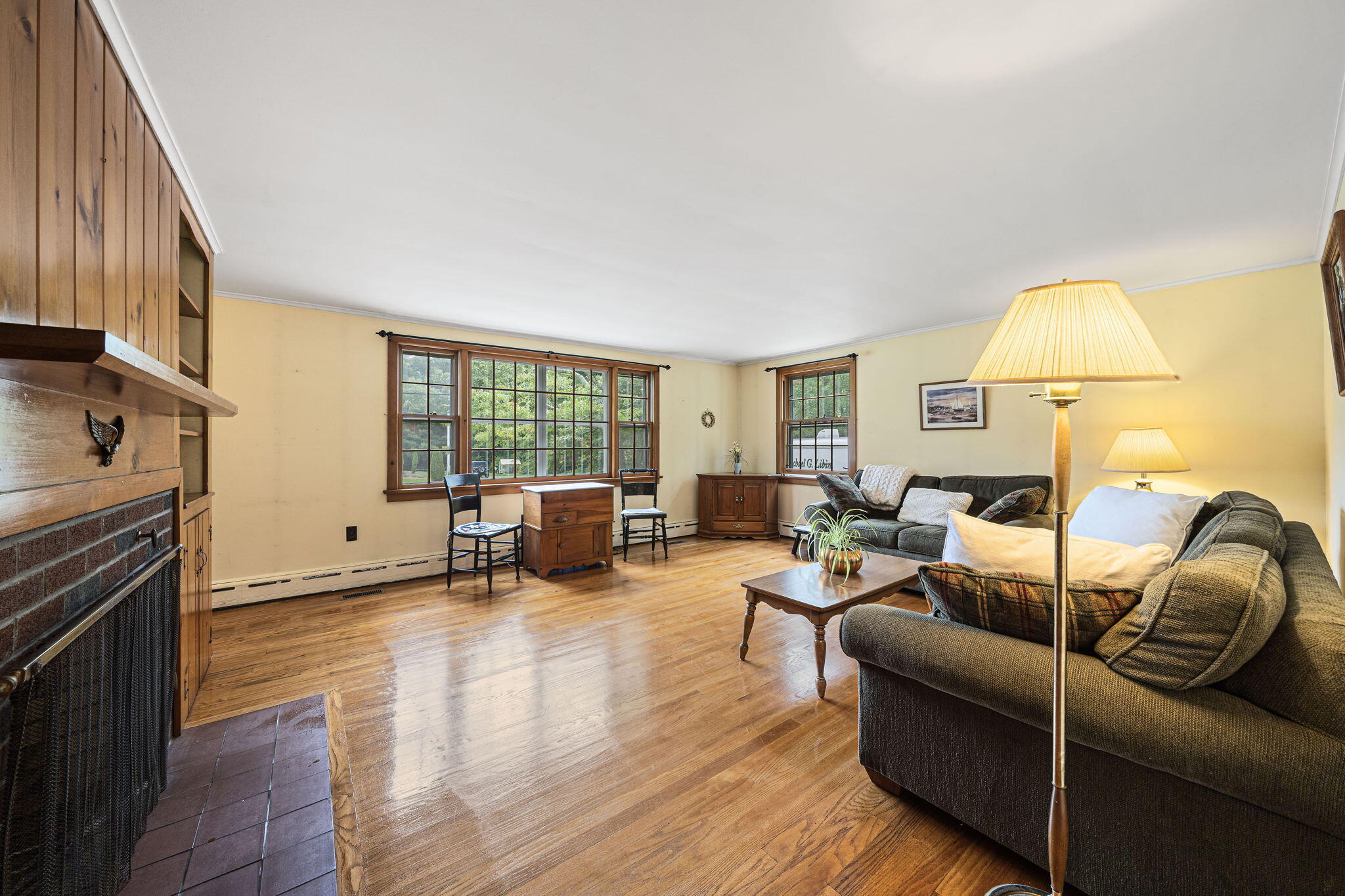 606 County Road Pocasset, MA 02559 - Photo 5 of 36 a living room with furniture and a fireplace