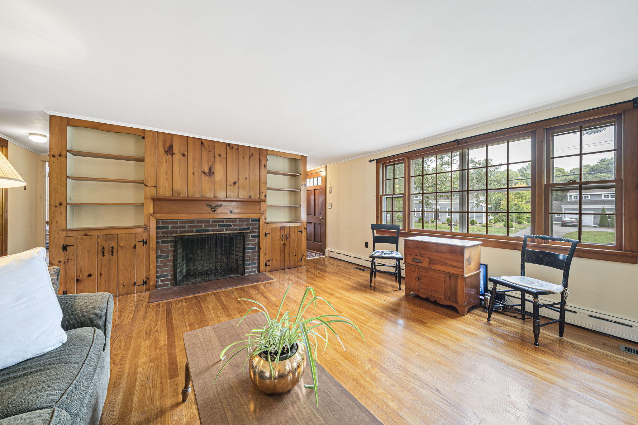 606 County Road Pocasset, MA 02559 - Photo 6 of 36 a living room with furniture and a fireplace
