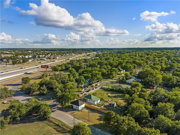 a view of a city with lots of green space