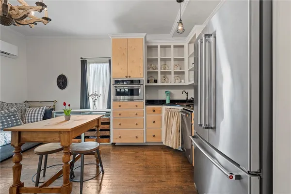 a kitchen that has a cabinets counter space and appliances