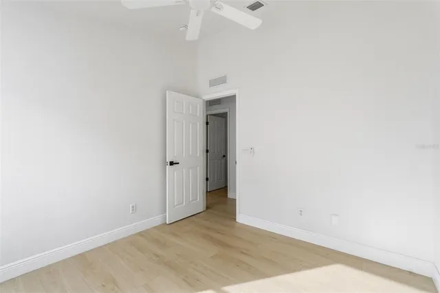 an empty room with a bathroom