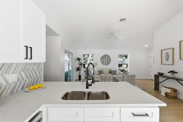 a view of kitchen sink and natural light