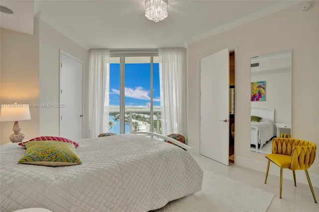 a bedroom with a bed and a chair