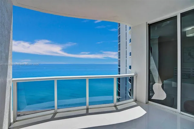 a view of an ocean from a balcony
