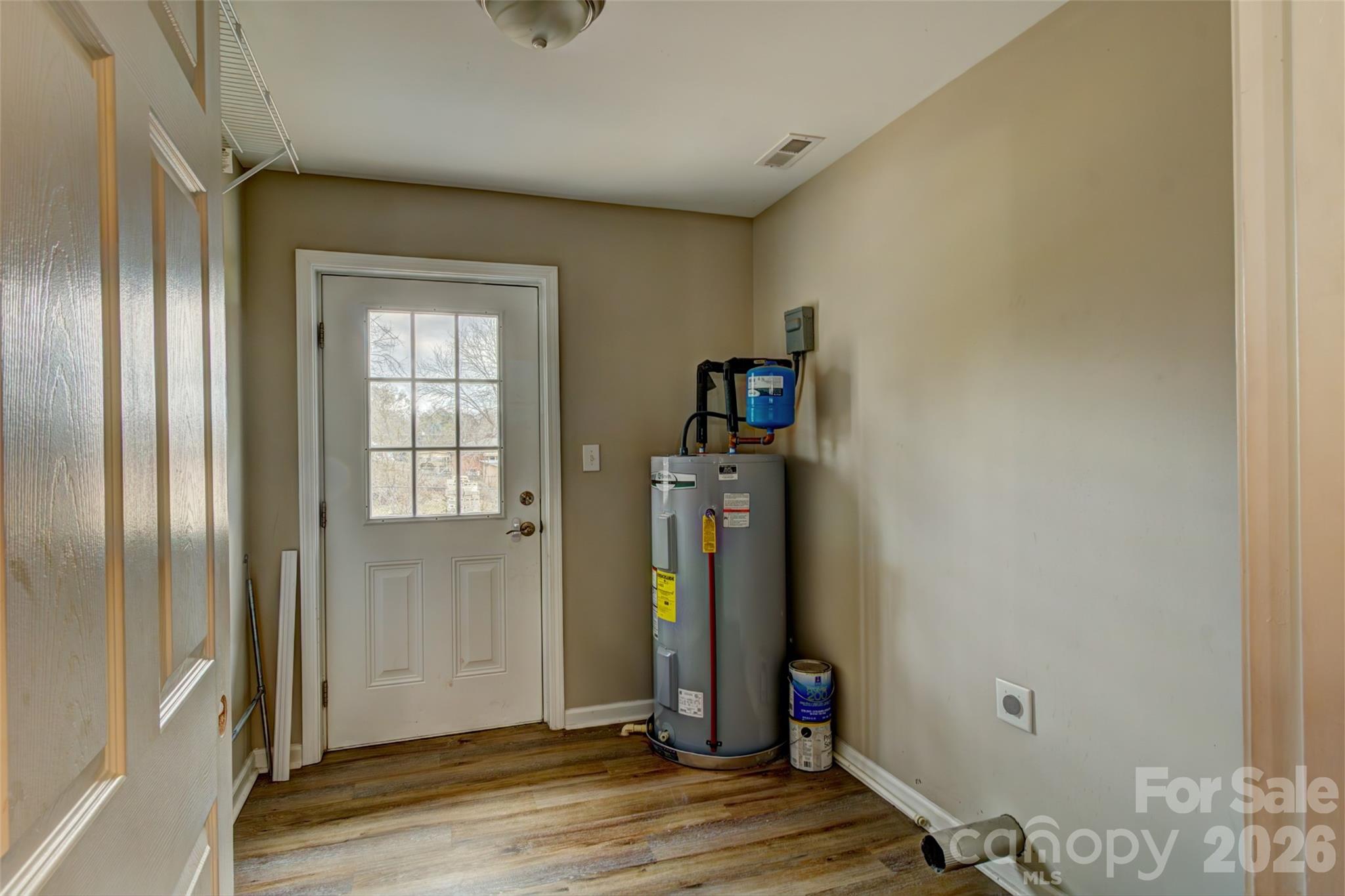 202 Ramsey Street Cherryville, NC 28021 - Photo 14 of 17 a view of a room with wooden floor