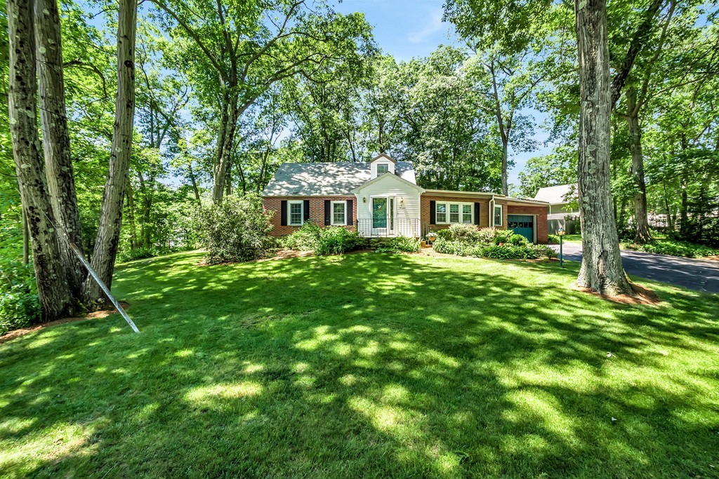 59 Munroe Road Lexington, MA 02421 - Photo 27 of 29 a house view with a garden space