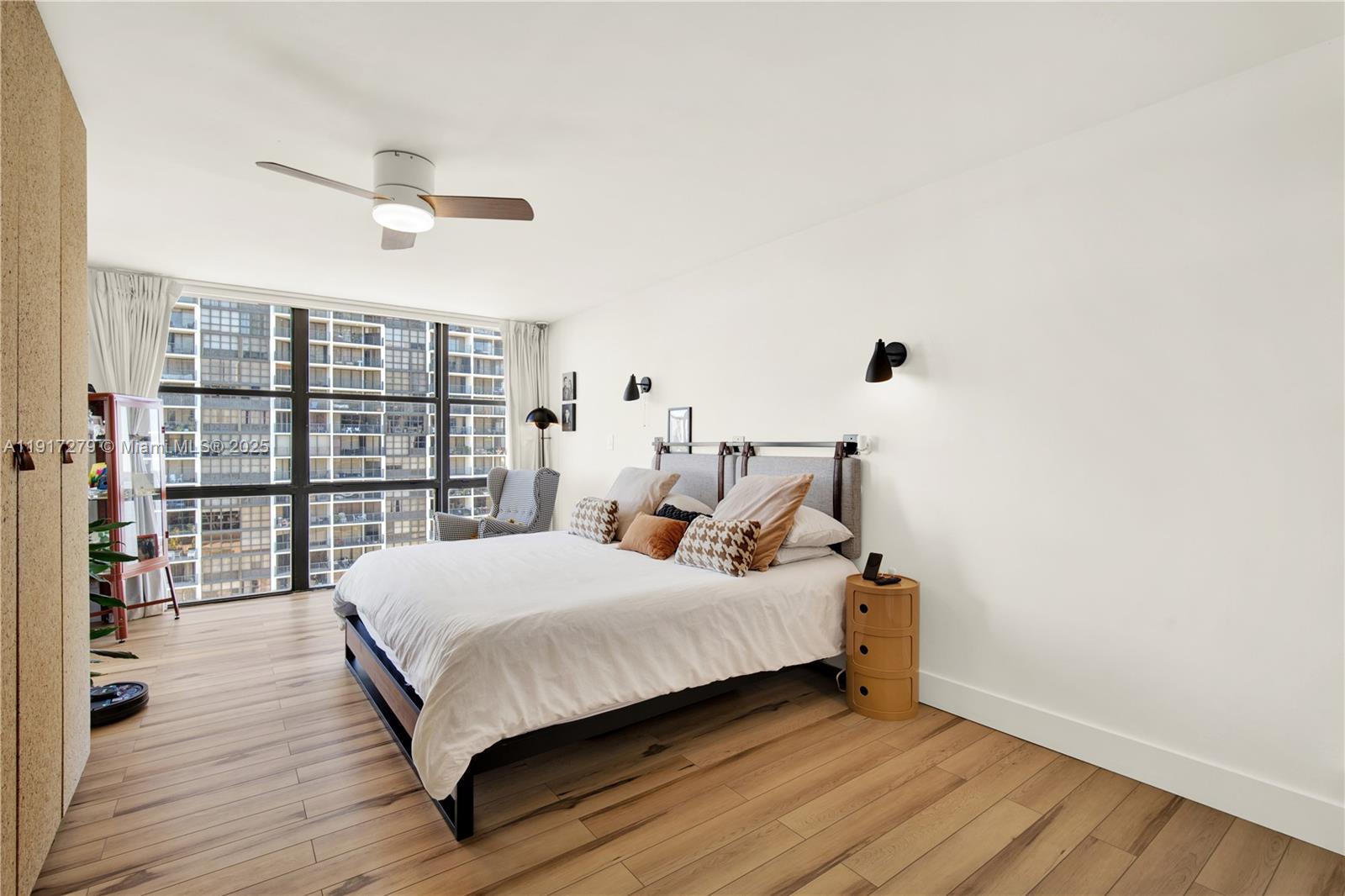 1915 Brickell Avenue, Unit C1101 Miami, FL 33129 - Photo 21 of 55 a bedroom with a bed and a large window