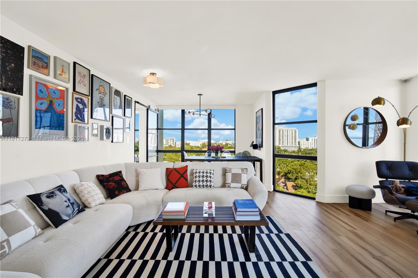 1915 Brickell Avenue, Unit C1101 Miami, FL 33129 - Photo 3 of 55 a living room with furniture a rug and a window