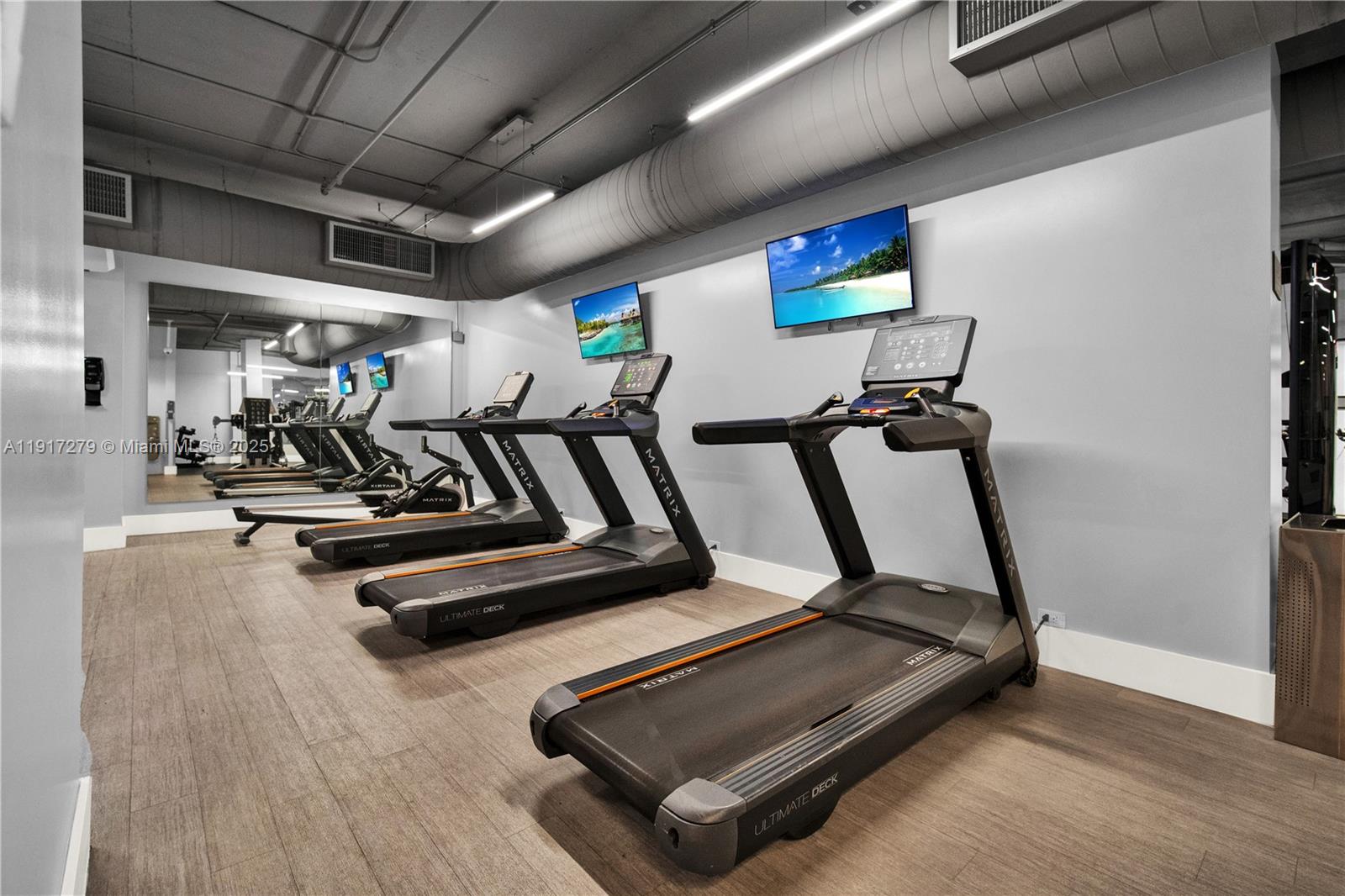 1915 Brickell Avenue, Unit C1101 Miami, FL 33129 - Photo 39 of 55 a view of a room with gym equipment