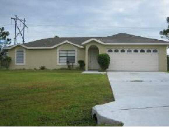 1099 Wing Road Southwest Palm Bay, FL 32908 - Photo 1 of 6 Primary Photo
