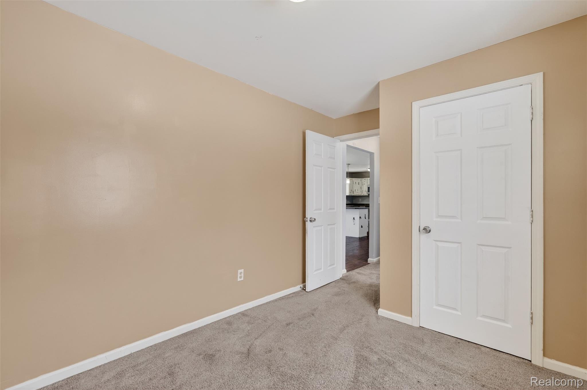 5417 Rensselear Drive Lapeer, MI 48446 - Photo 27 of 41 Unfurnished bedroom featuring carpet and baseboards