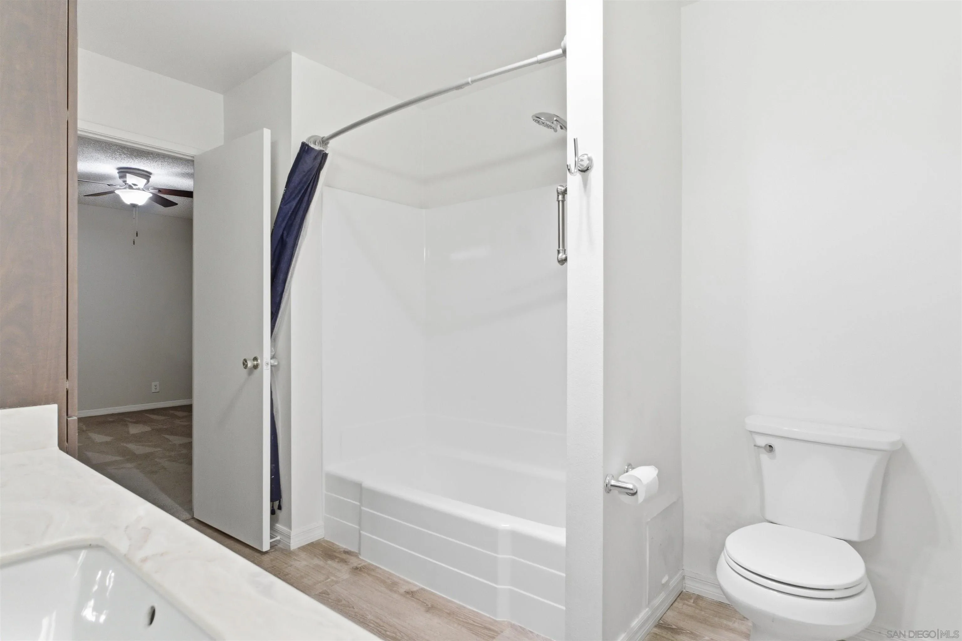 3625 Dearborn Street Oceanside, CA 92057 - Photo 23 of 30 a bathroom with a shower and a toilet