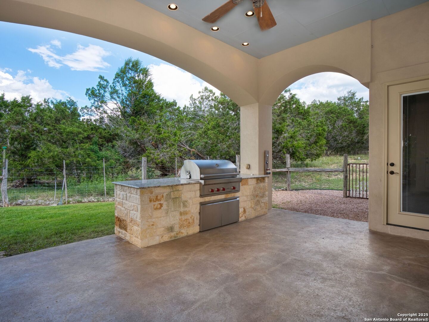 103 Falcon Crest Boerne, TX 78006 - Photo 28 of 35 a view of a porch with furniture and garden