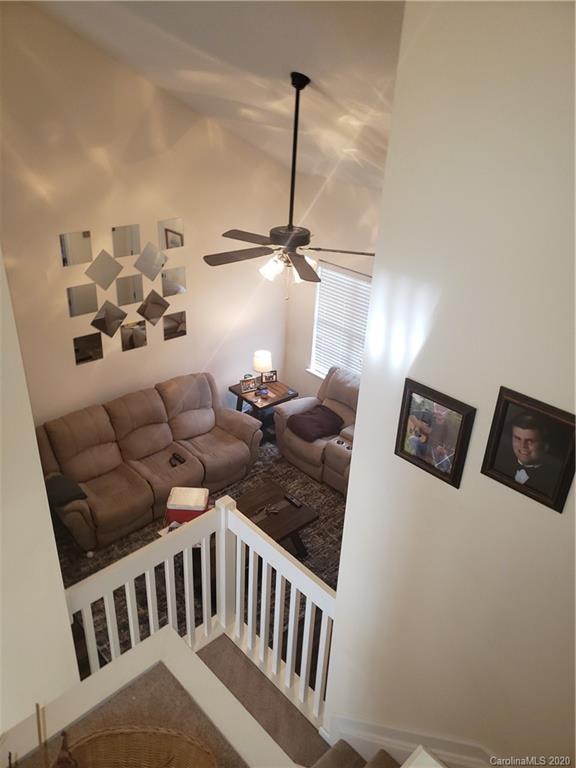 8360 Rudolph Road, Unit 2105 Charlotte, NC 28216 - Photo 14 of 14 a view of a livingroom with furniture and window
