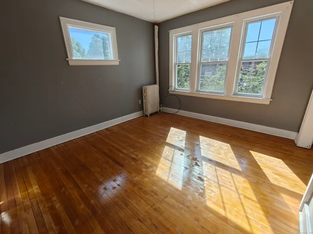 a view of an empty room and window