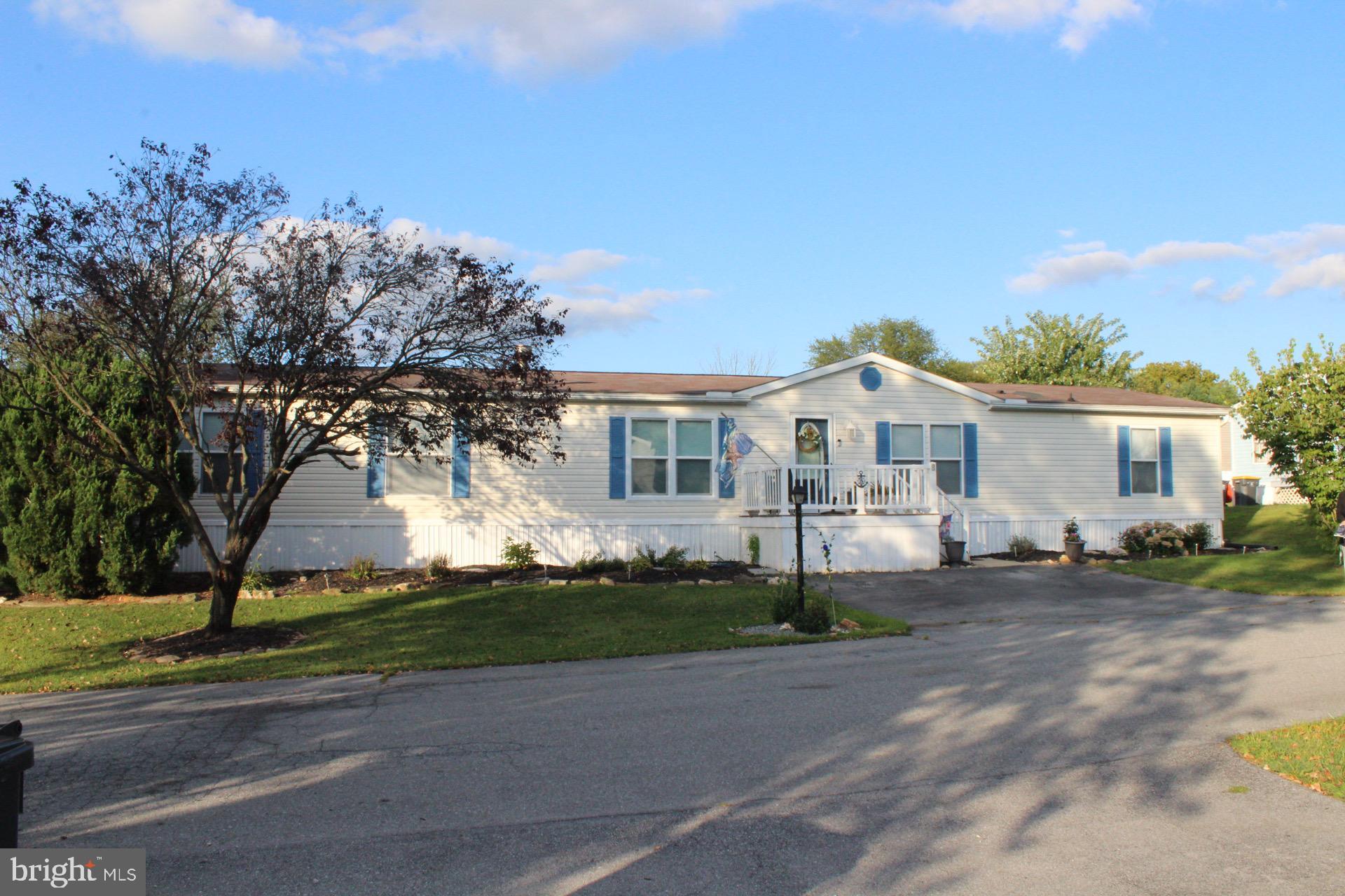 Charming home with inviting curb appeal.