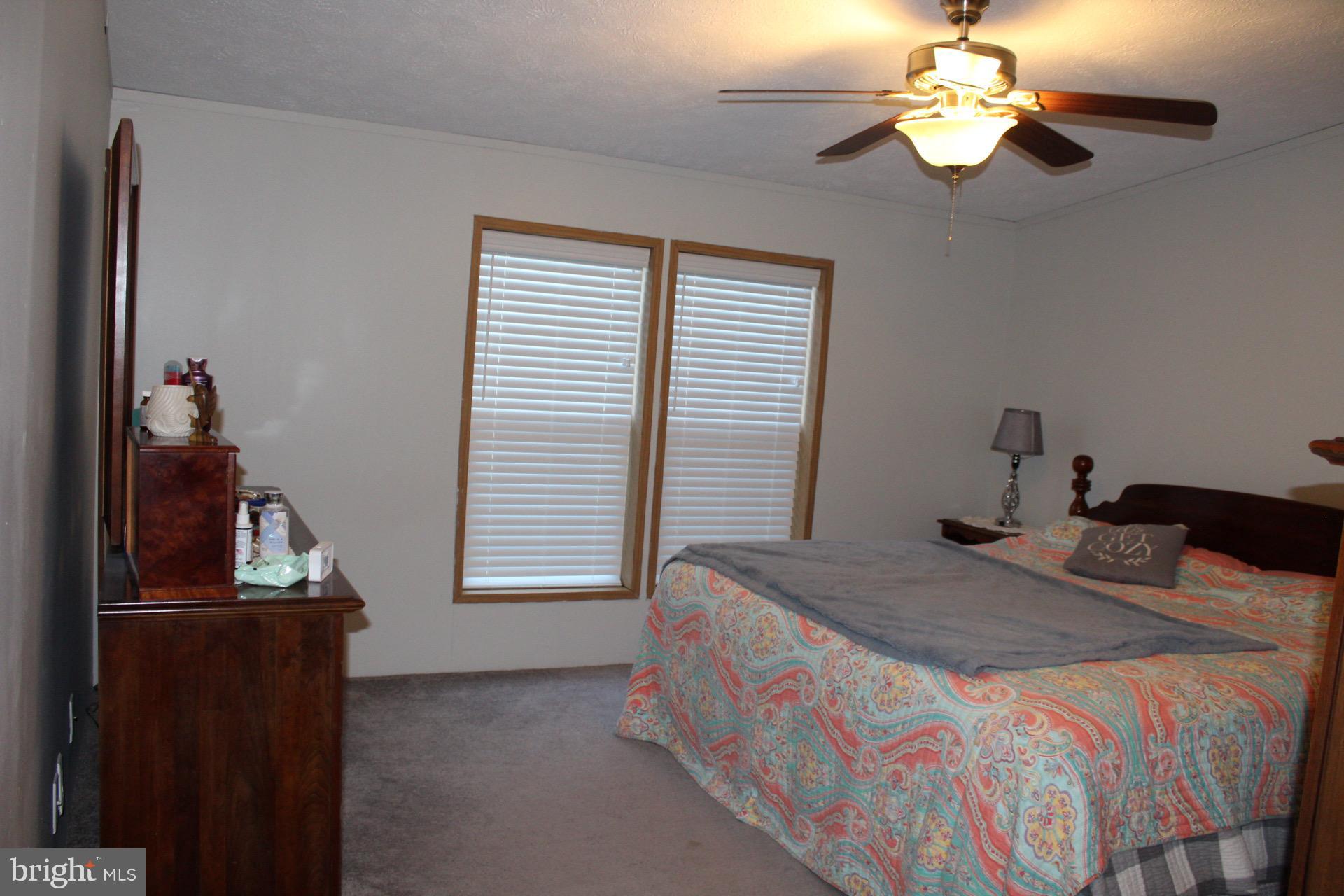 8 Williams Way Avondale, PA 19311 - Photo 13 of 24 Cozy bedroom with natural light and charm.
