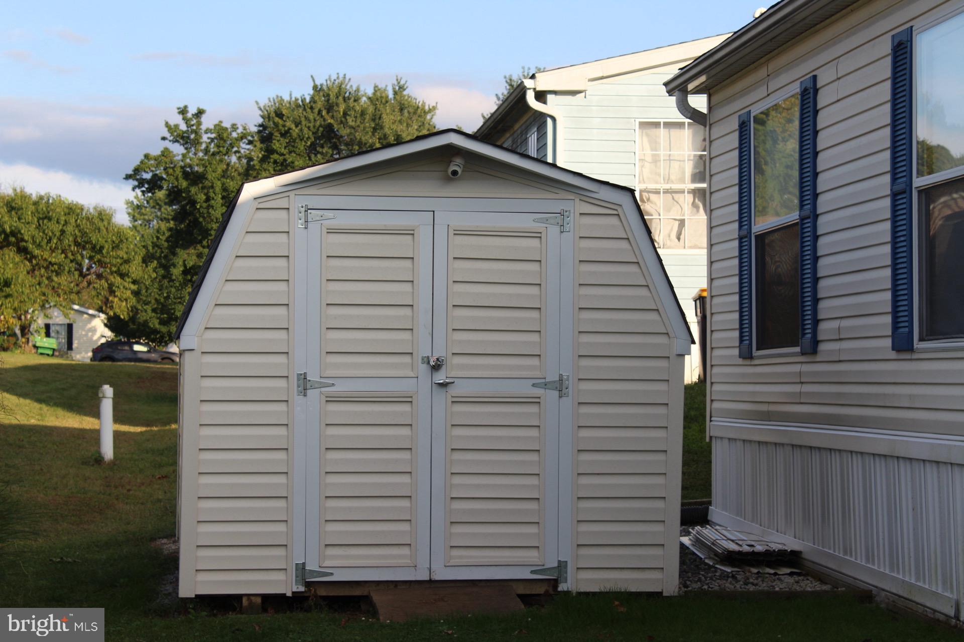 8 Williams Way Avondale, PA 19311 - Photo 24 of 24 Charming storage shed in a serene setting.