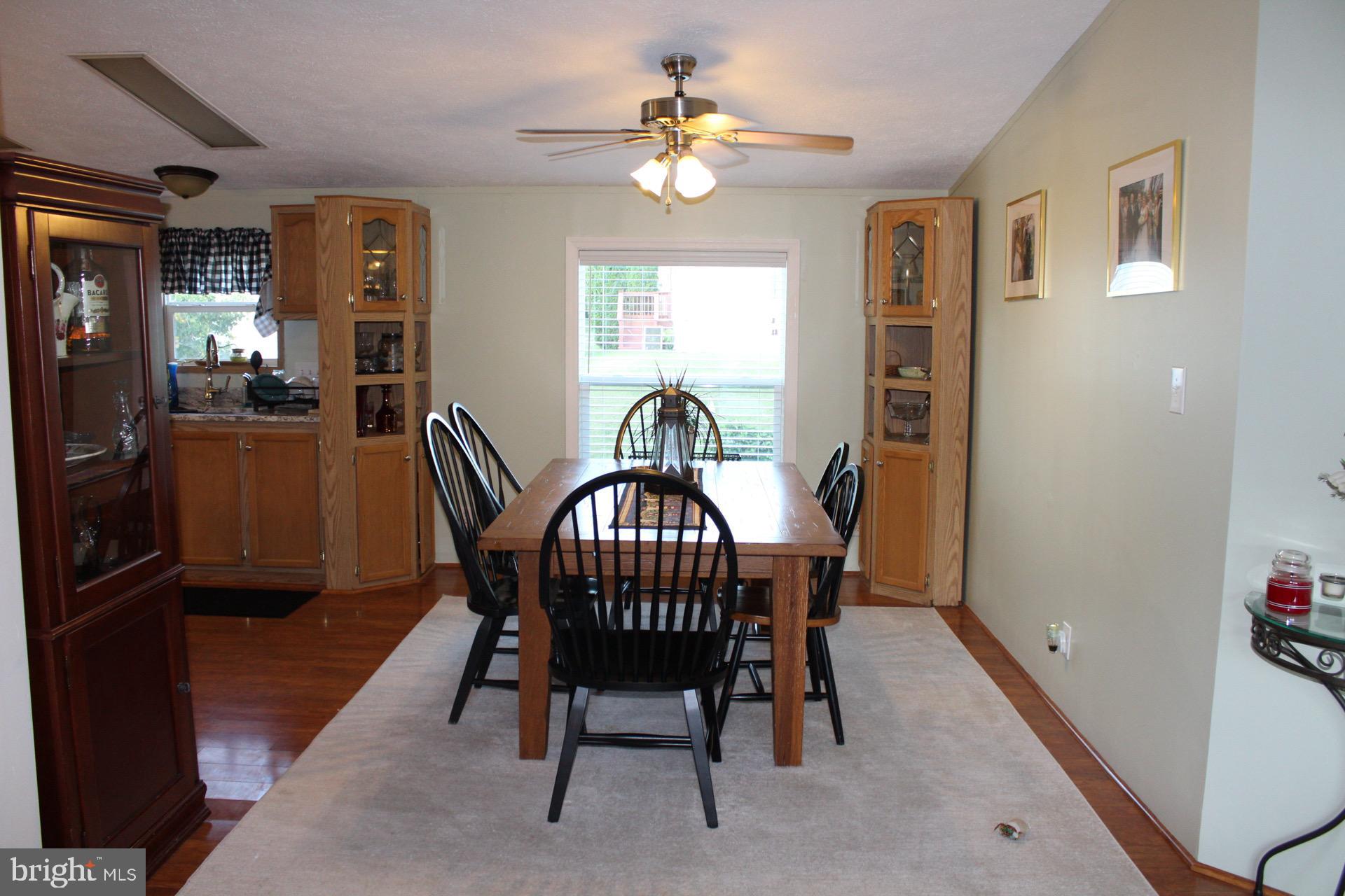 8 Williams Way Avondale, PA 19311 - Photo 6 of 24 Inviting dining space with natural light.