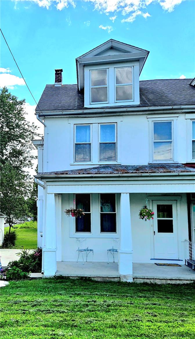 10 Barto Road Barto, PA 19504 - Photo 1 of 17 Classic multi-story architecture features a prominent front porch and a distinctive gabled dormer.