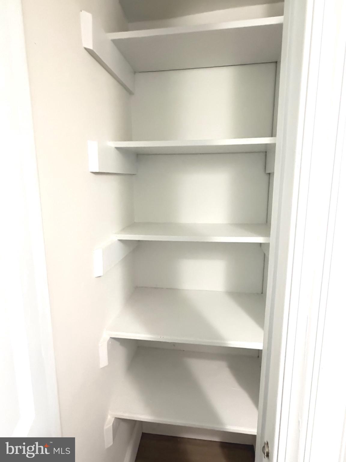 2316 Freetown Court, Unit 1B Reston, VA 20191 - Photo 19 of 36 a view of a store room with shelves