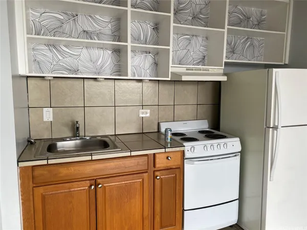 a utility room with washer and dryer