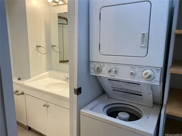 a utility room with dryer and washer