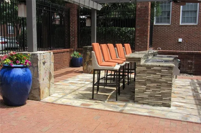 a dining room with a table and chairs