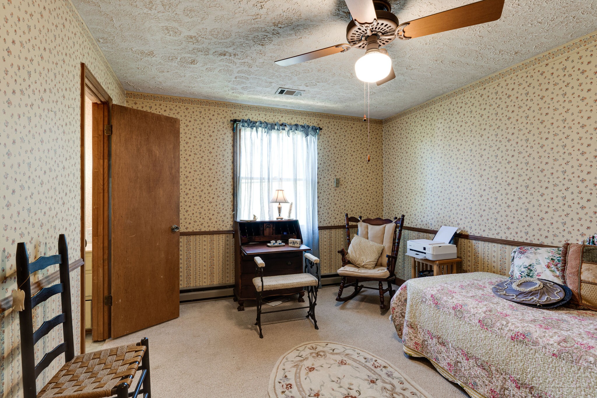 2729 Gideon Road Greenbrier, TN 37073 - Photo 17 of 30 a bedroom with furniture and a chandelier
