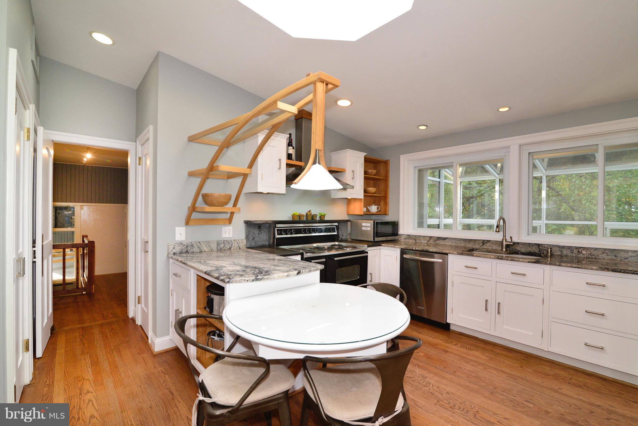 9944 Lawyers Road Vienna, VA 22181 - Photo 8 of 30 Open kitchen w/ granite, SS appliances, eat-in
