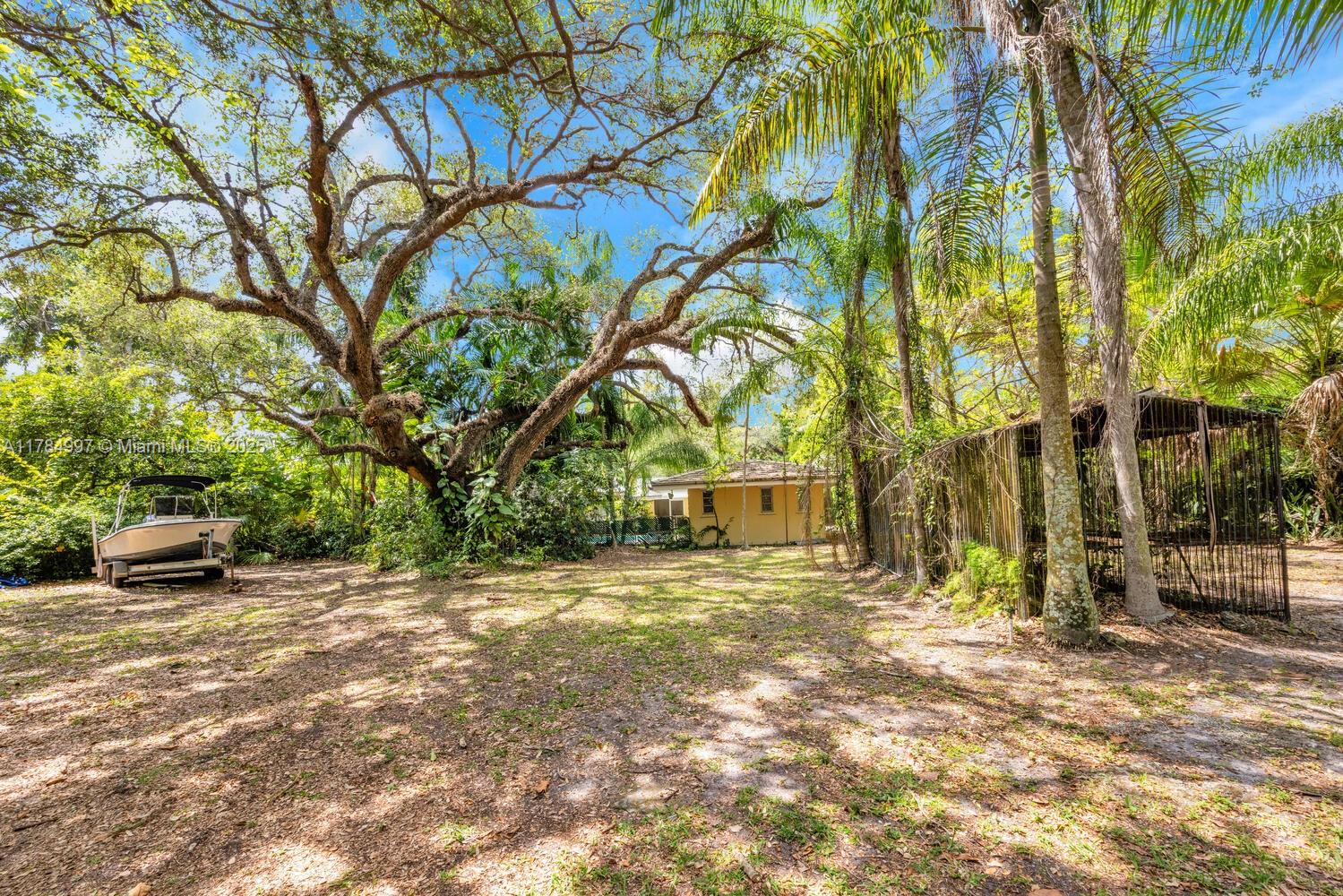 4151 Douglas Road Miami, FL 33133 - Photo 12 of 24 a view of a outdoor space with car parked