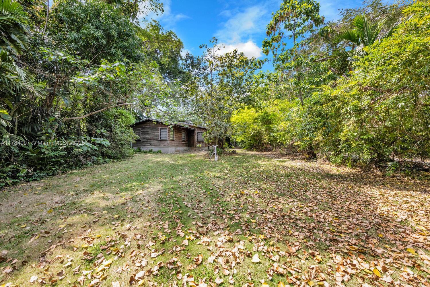 4151 Douglas Road Miami, FL 33133 - Photo 14 of 24 a view of a yard with an outdoor space