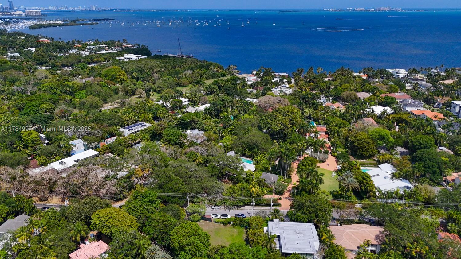 4151 Douglas Road Miami, FL 33133 - Photo 5 of 24 a view of a bunch of trees and houses