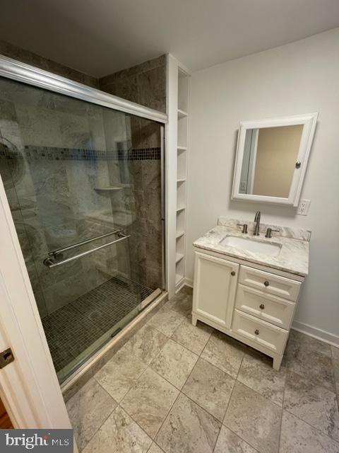 1750 Waterloo Street Philadelphia, PA 19122 - Photo 6 of 15 a bathroom with a sink mirror and shower