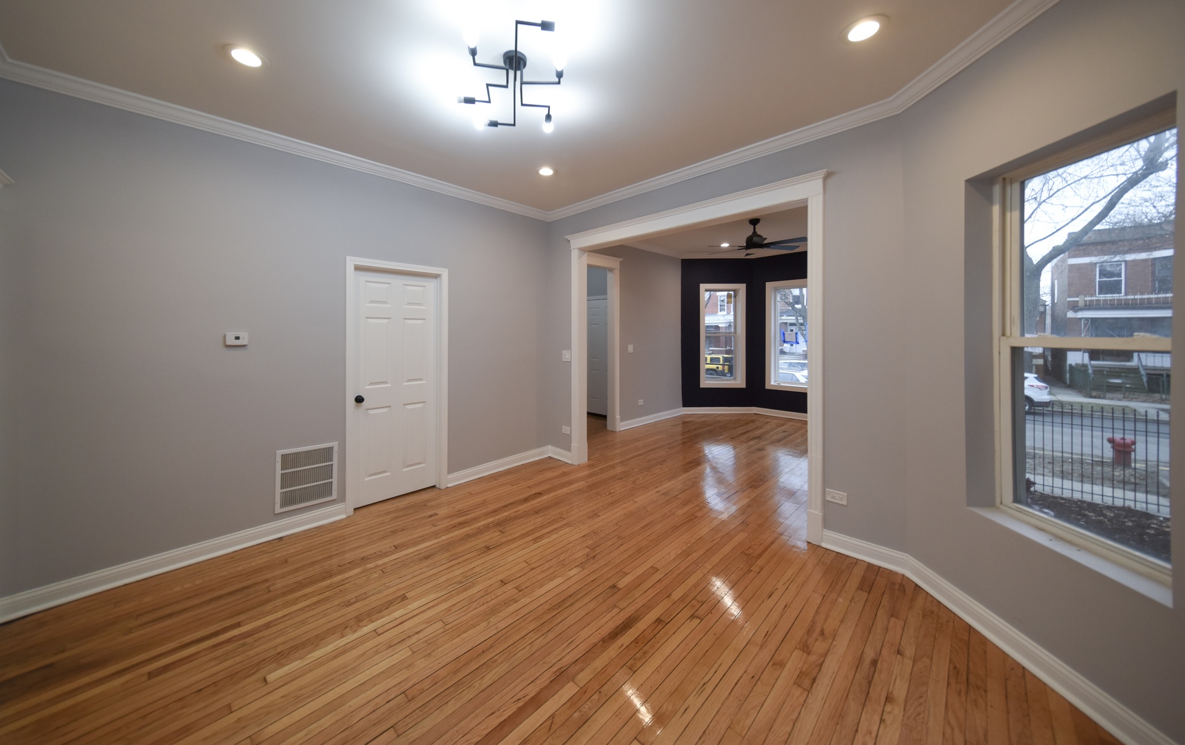 5932 South Elizabeth Street Chicago, IL 60636 - Photo 8 of 25 a view of a livingroom with a chandelier