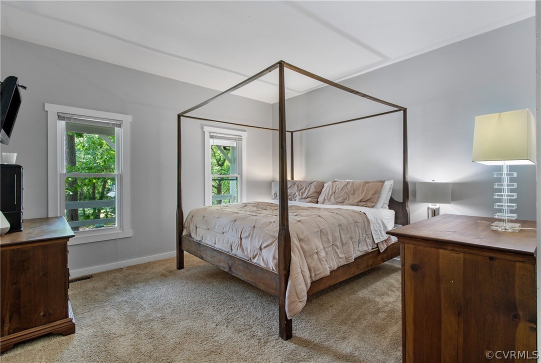11210 Moravia Road Midlothian, VA 23112 - Photo 14 of 29 a bedroom with a bed and window