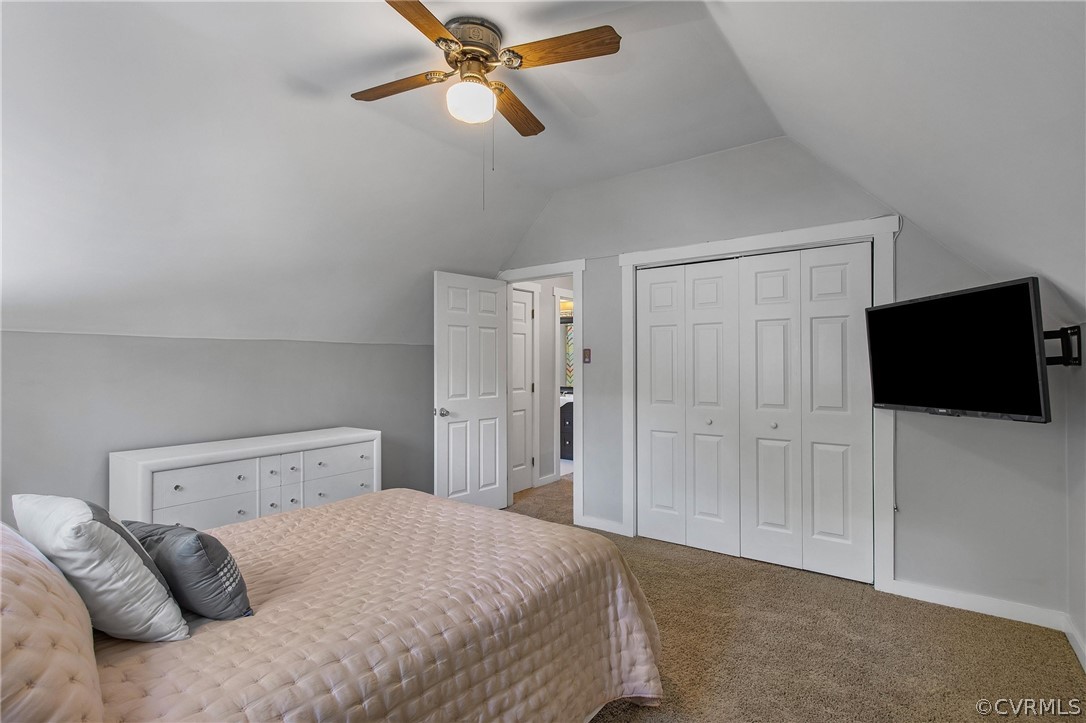 11210 Moravia Road Midlothian, VA 23112 - Photo 19 of 29 a bedroom with a bed and a flat screen tv