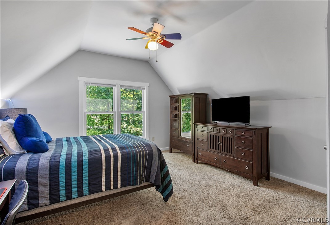 11210 Moravia Road Midlothian, VA 23112 - Photo 21 of 29 a bedroom with a bed and a flat screen tv