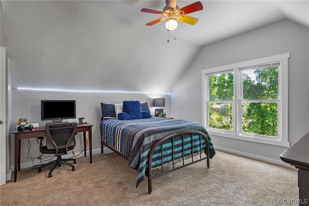 11210 Moravia Road Midlothian, VA 23112 - Photo 22 of 29 a bedroom with a bed a computer on a desk and a printer next to a window