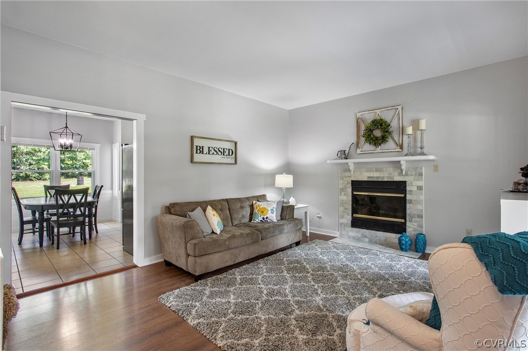 11210 Moravia Road Midlothian, VA 23112 - Photo 7 of 29 a living room with furniture and a fireplace