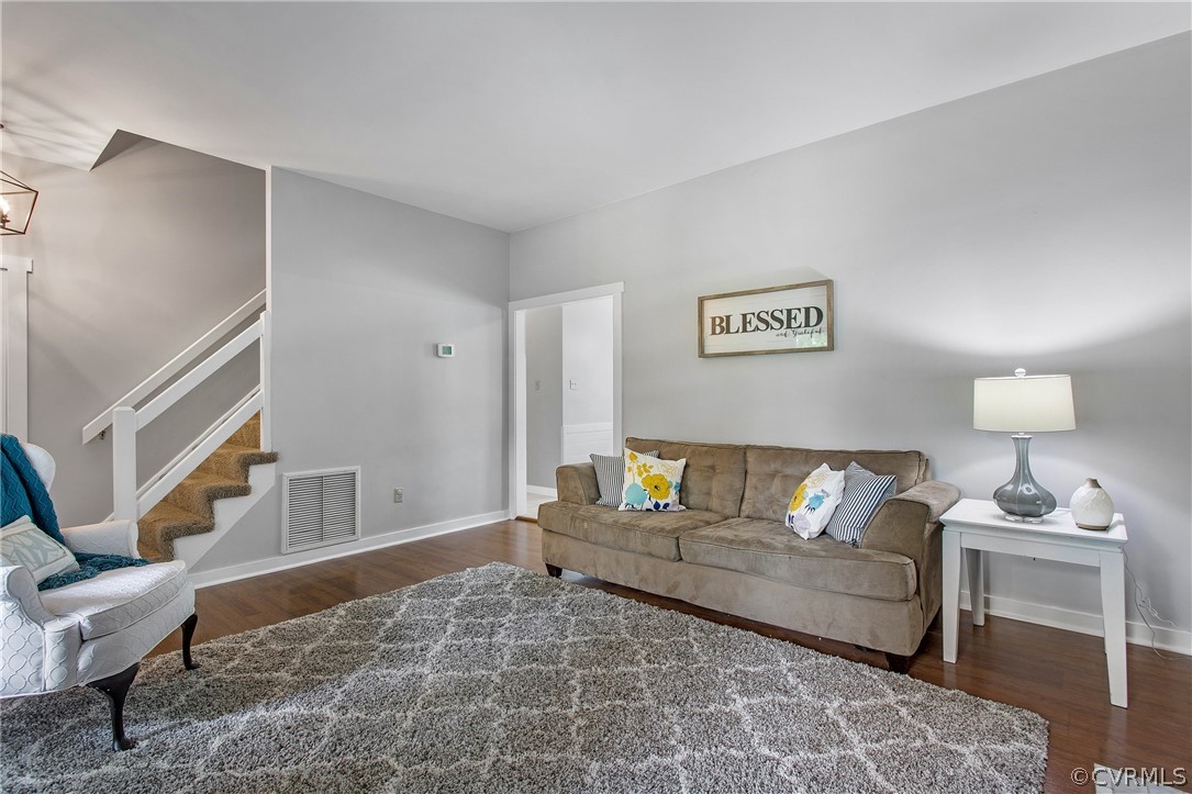 11210 Moravia Road Midlothian, VA 23112 - Photo 9 of 29 a living room with furniture and a rug