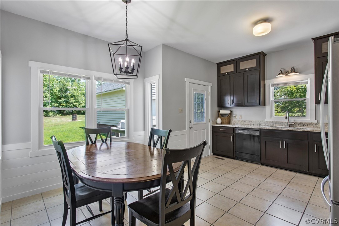 11210 Moravia Road Midlothian, VA 23112 - Photo 10 of 29 a view of a dining room with furniture window and outside view