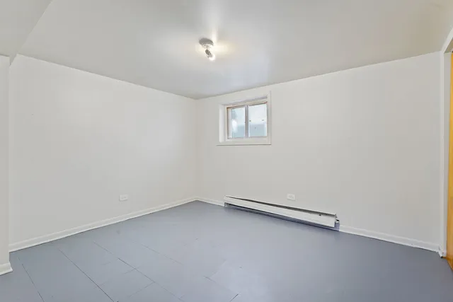 an empty room with a workbench