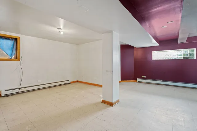 an empty room with a projector