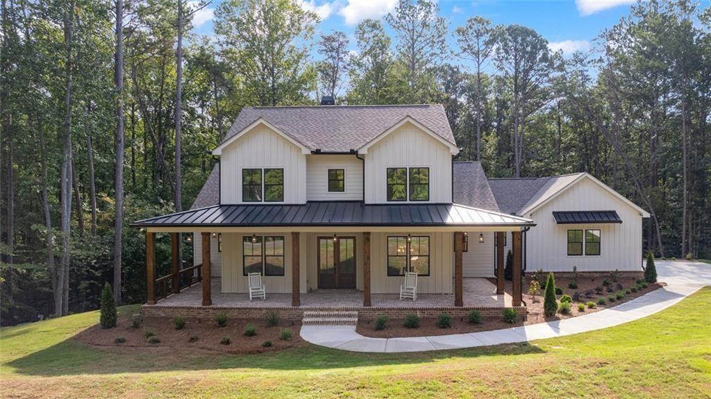 240 Highlands Ball Ground, GA 30107 - Photo 1 of 57 a view of a house with swimming pool and sitting area