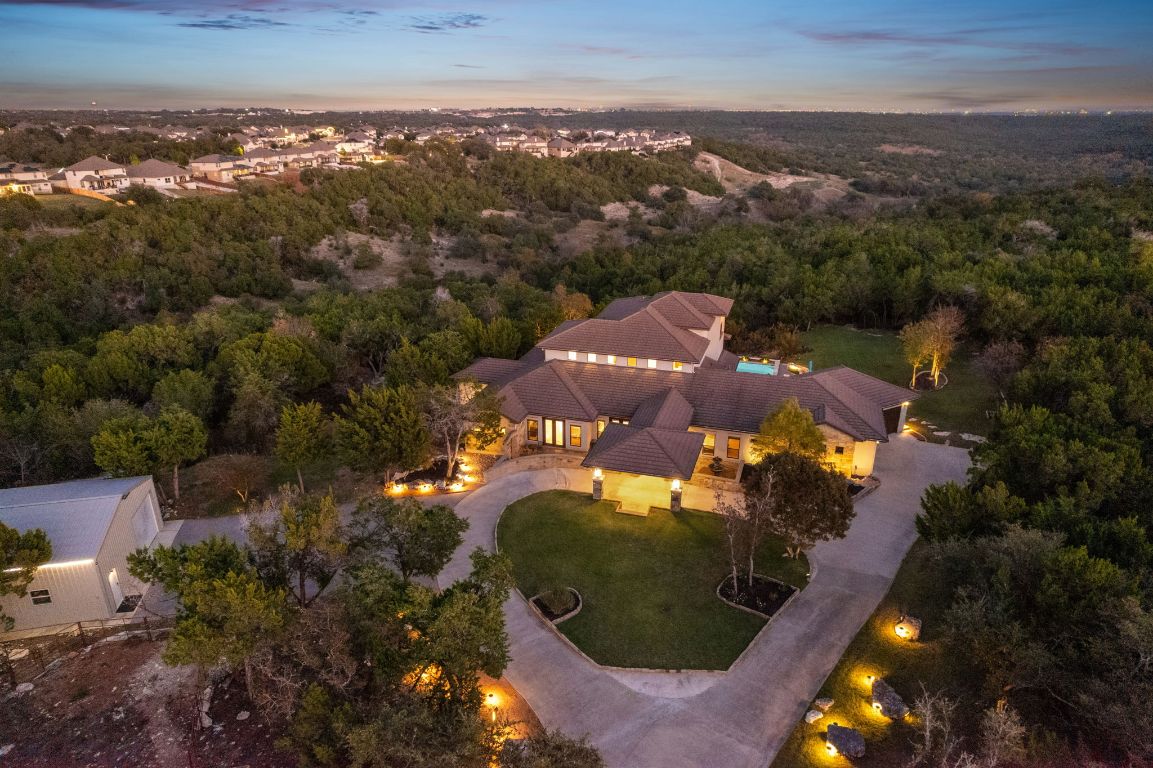 Private, gated custom home with a pool on more than 1.7 acres